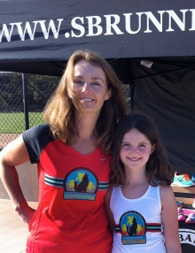 Photo of Coach Becky Aaronson of Kids Corner Coyotes with daughter Olivia